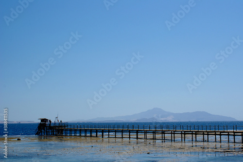 Island Pier Distant Seashore Shoreline