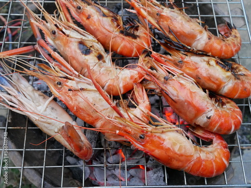 grilled river prawn or river shrimp on charcoal stove.