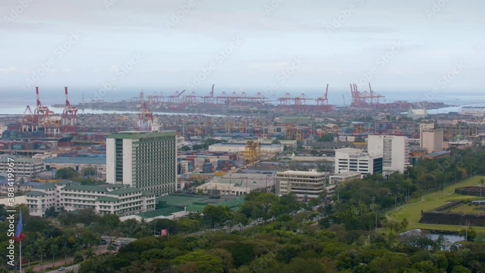 Slow Motion Panning Shot Of Manila Hotel, And Port Area In Manila City