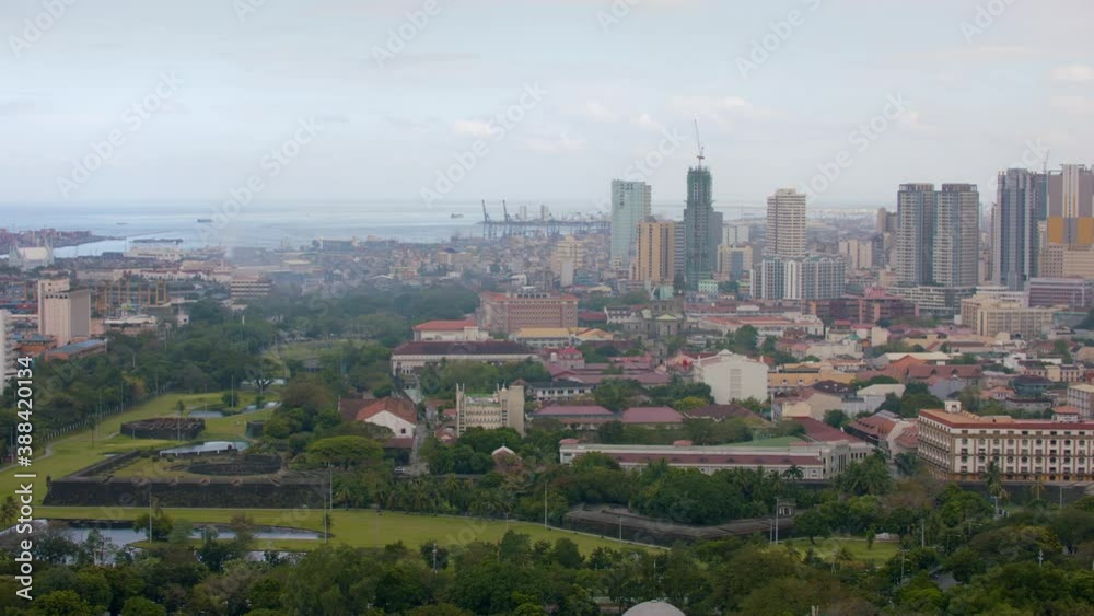 Slow Motion Panning Shot Of Intramuros, Binondo Central Business District, And Manila City Slow Motion Panning Shot Of Intramuros, Binondo Central Business District, And Manila City