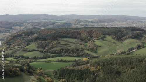 Beautiful german landscape in the Werratal in hessen near witzenhausen. Autumn in a european forest with orange and green leafs. photo