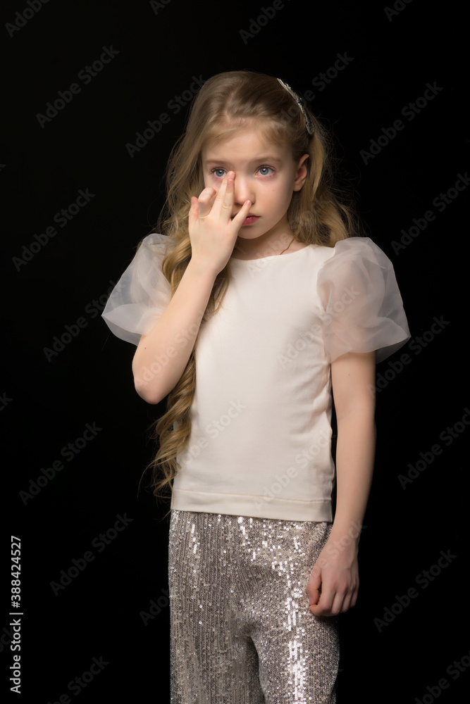 Cute little girl crying. The concept of emotions, the psychological state of the child, children's fears. Cute little girl crying. The concept of emotions, the psychological state of the child, children's fears.