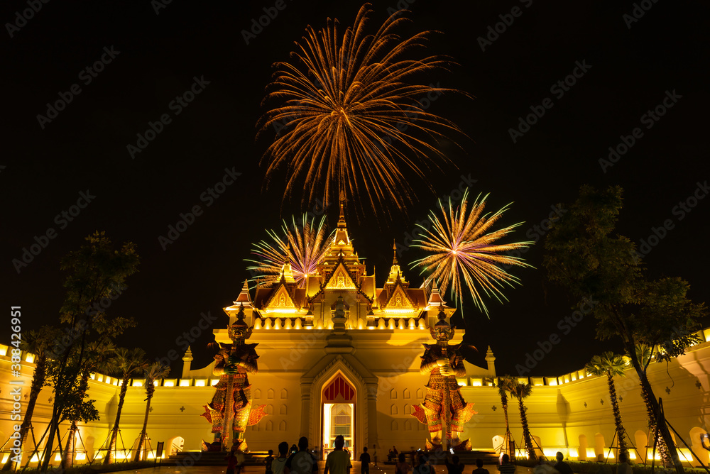 Fototapeta premium Colorful firework at floating market and traditional show new landmark Legent siam pattaya Chonburi,Thailand.