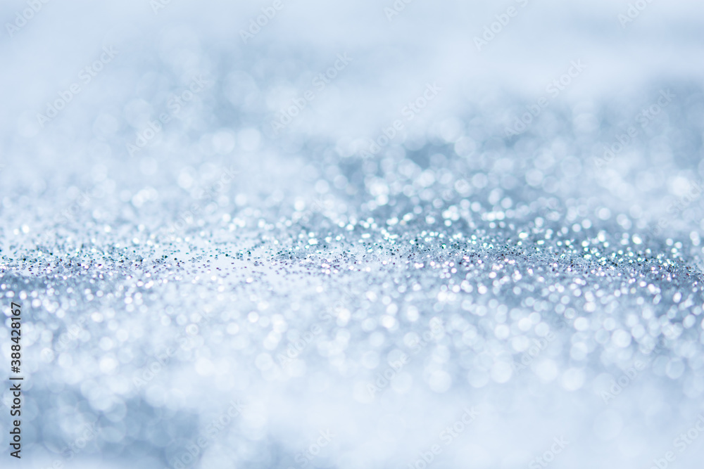 blurred abstract sparkling blue bokeh background. festive decoration for website banner and card concept blurred abstract sparkling blue bokeh background. festive decoration for website banner and card concept