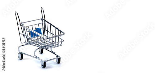 Empty mini trolley isolated on white background