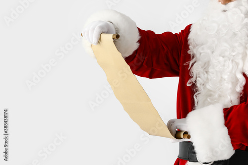 Santa Claus reading letter ...