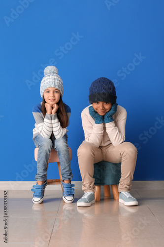 Cute children in winter clo...