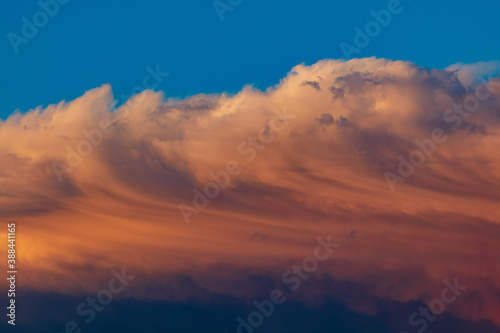 Colorful clouds at sunset as background.