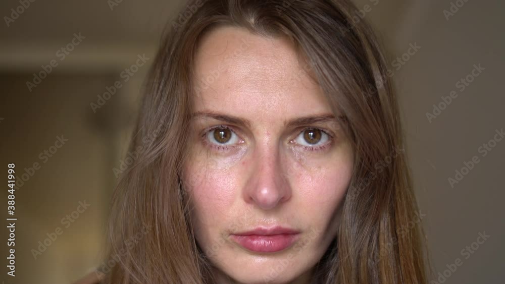 Woman very upset. Mistreated woman. Crying eyes of female. Portrait of brunette woman in the sorrow. Woman very upset. Mistreated woman. Crying eyes of female. Portrait of brunette woman in the sorrow.