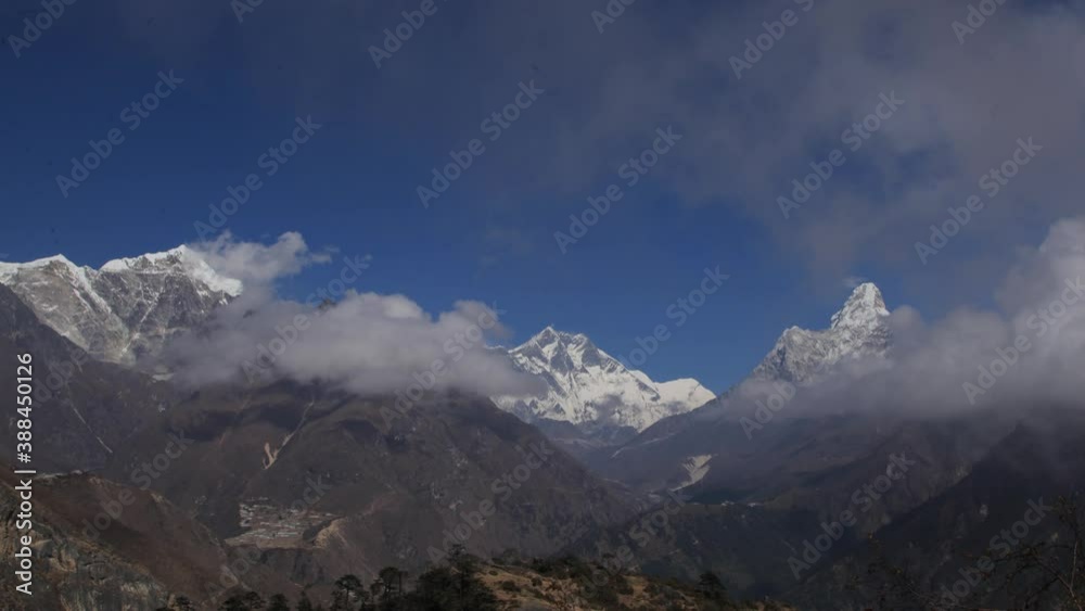 Timelapse of Area on South Ridge of Pumori in the Nepalese Himalayas with epic moving clouds and blue sky, Stock Footage HD Timelapse of Area on South Ridge of Pumori in the Nepalese Himalayas with epic moving clouds and blue sky, Stock Footage HD