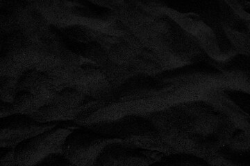 Top view Black sand texture background. Black Friday background concept.