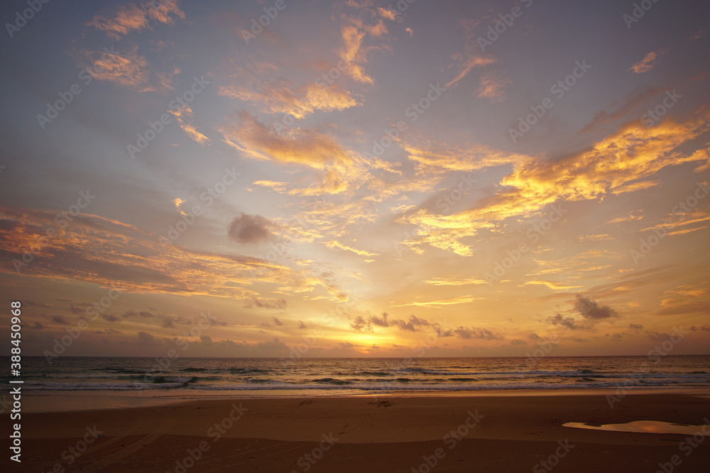 Fototapeta premium Nature background. Shot of Landscape amazing of red sky sunset in the sea with red clouds background. Travel concept.