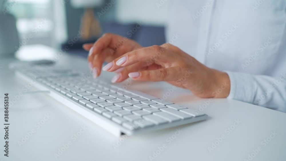 Female hands typing on a computer keyboard. Concept of remote work. Female hands typing on a computer keyboard. Concept of remote work.