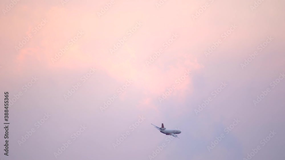 Air tanker plane flying in the skies of Colorado