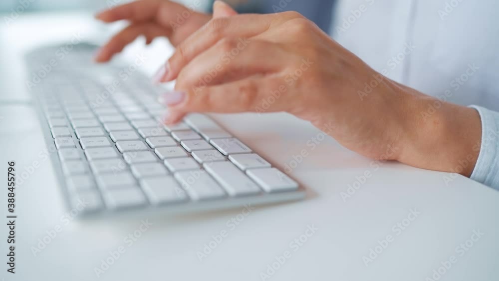 Female hands typing on a computer keyboard. Concept of remote work. Female hands typing on a computer keyboard. Concept of remote work.
