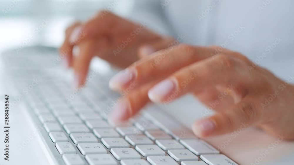 Female hands typing on a computer keyboard. Concept of remote work. Female hands typing on a computer keyboard. Concept of remote work.