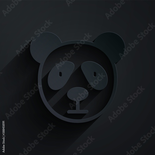 Paper cut Cute panda face icon isolated on black background. Animal symbol. Paper art style. Vector.