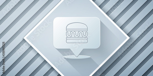 Paper cut Online ordering and burger delivery icon isolated on grey background. Paper art style. Vector.