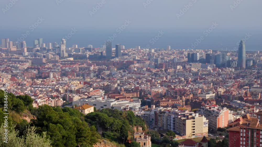 Panning panoramic shot over polluted barcelona skyline, famous mediterranean city in Spain. beautiful view of touristic Catalonia capital Panning panoramic shot over polluted barcelona skyline, famous mediterranean city in Spain. beautiful view of touristic Catalonia capital