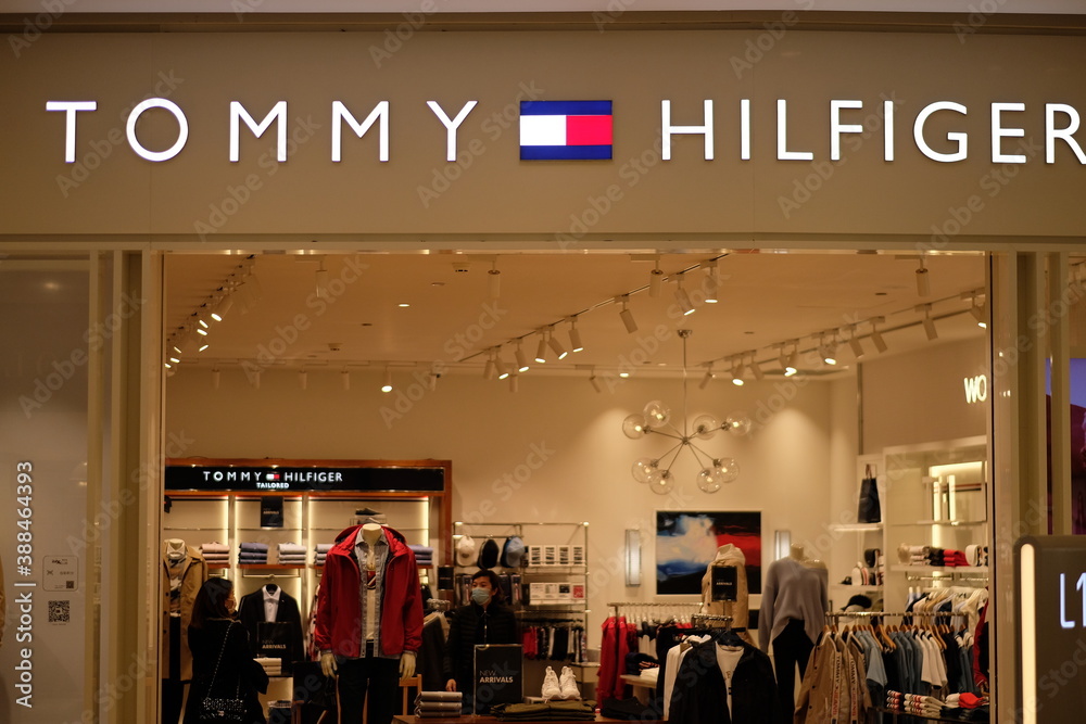 Shanghai/China-March 2020: Facade of TOMMY HILFIGER store. A clothing brand  from America. Stock Photo | Adobe Stock