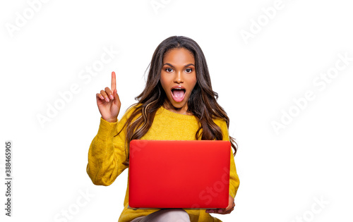 African American girl using laptop. Isolated. Person and Laptop. excited   photo