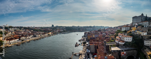 The cty streets and river of porto oporto city in portugal at sunset