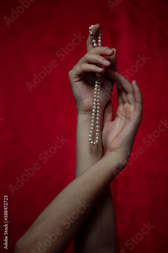 hands with beads