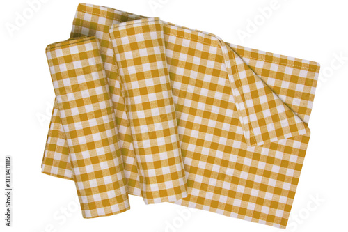 Towels isolated. Close-up of brown yellow and white checkered napkin or picnic tablecloth texture isolated on a white background. Kitchen towel.