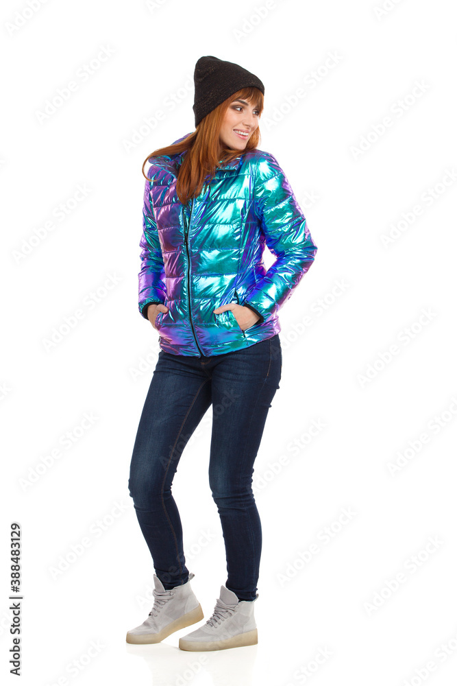 Beautiful Young Woman Winter Clothes Is Smiling And Looking Away Over The Shoulder Beautiful Young Woman Winter Clothes Is Smiling And Looking Away Over The Shoulder