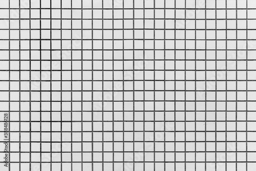 White mosaic wall tile pattern texture and seamless background