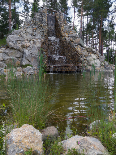 A popular tourist destination on the mountain Borja, near the hotel Hajdučke vode near Teslić. Artificial waterfall and lake. photo