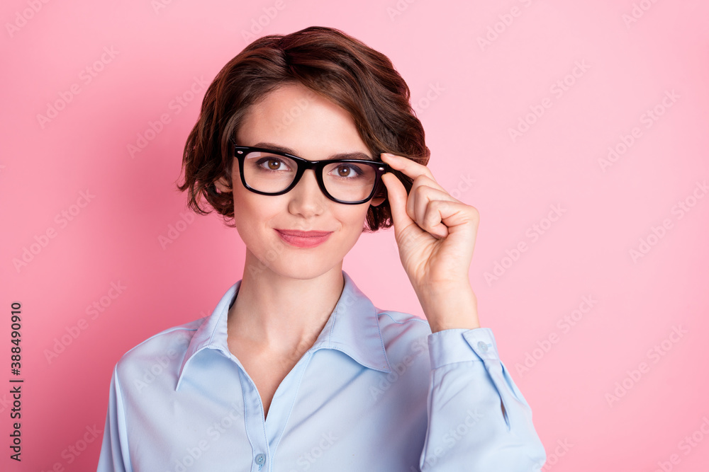 Close-up portrait of her she nice attractive lovely cheery content brown-haired girl executive assistant specialist ceo boss chief employee touching specs isolated pink pastel color background