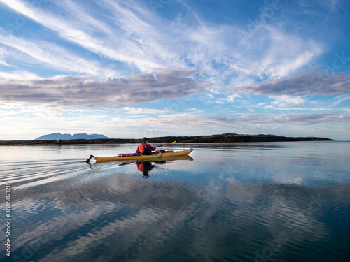 Kayak on the sea on a clear day in Northern Norway photo