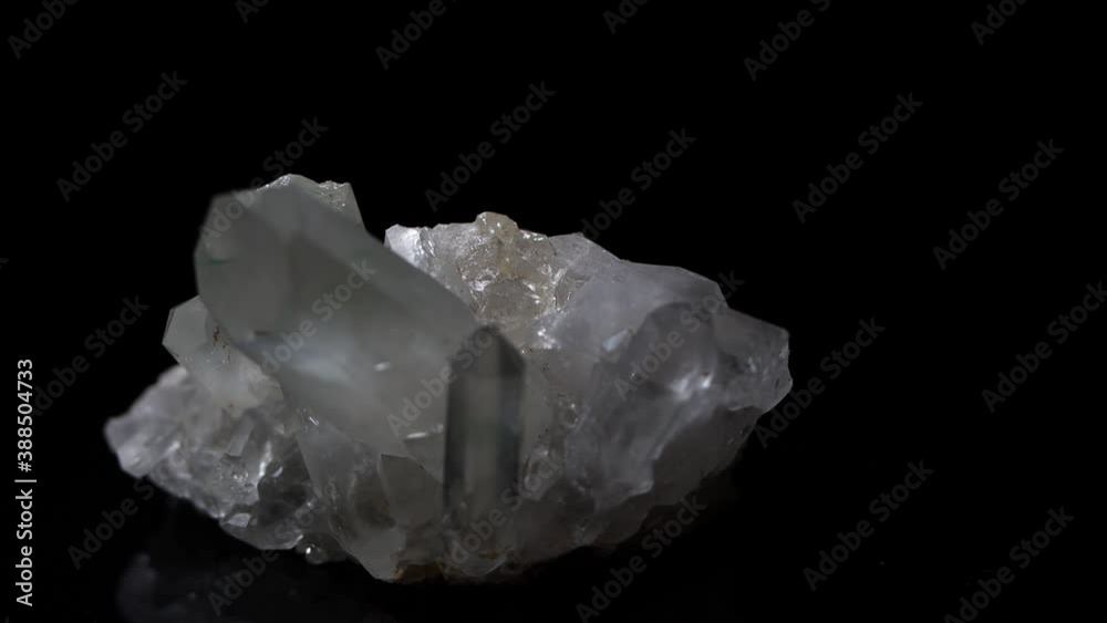 Quartz crystals emerge from a piece of stone. Ghostly in appearance. Quartz crystals emerge from a piece of stone. Ghostly in appearance.