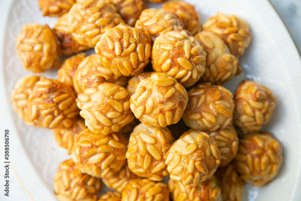 Almond and pine nuts Panellets . Traditional Catalan sweet made with potato, egg, sugar, almonds and pine nuts. Prepares to celebrate Halloween and November 1st