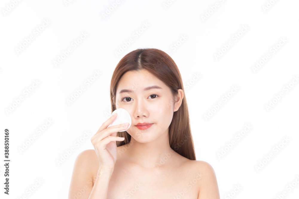 Attractive beauty young asian woman clean skin with cotton pad removing make up on white background. Attractive beauty young asian woman clean skin with cotton pad removing make up on white background.