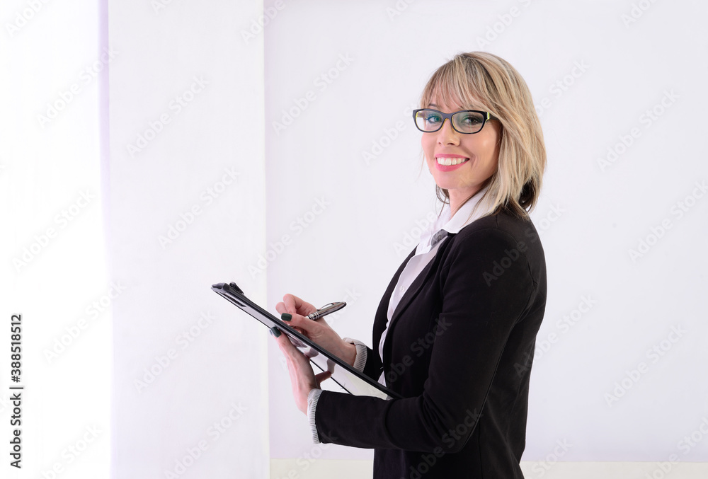 Adorable and young businesswoman taking note Adorable and young businesswoman taking note