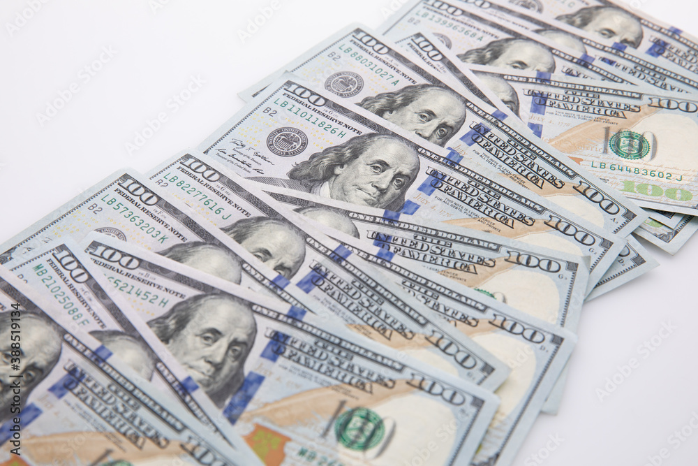 collection of hundred-dollar banknotes isolated on white background, close view collection of hundred-dollar banknotes isolated on white background, close view