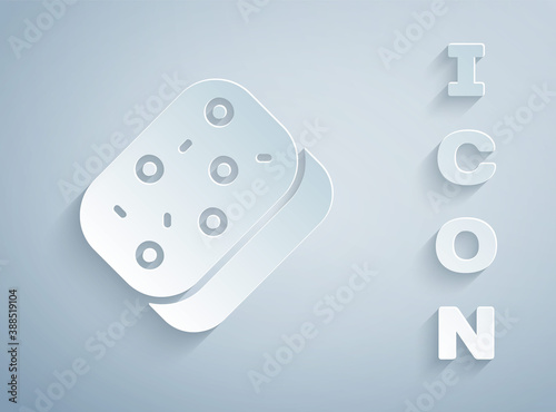 Paper cut Sponge with bubbles icon isolated on grey background. Wisp of bast for washing dishes. Cleaning service logo. Paper art style. Vector.