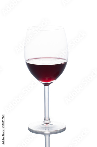 red wineglass isolated on white background with clipping path and copy space for your text
