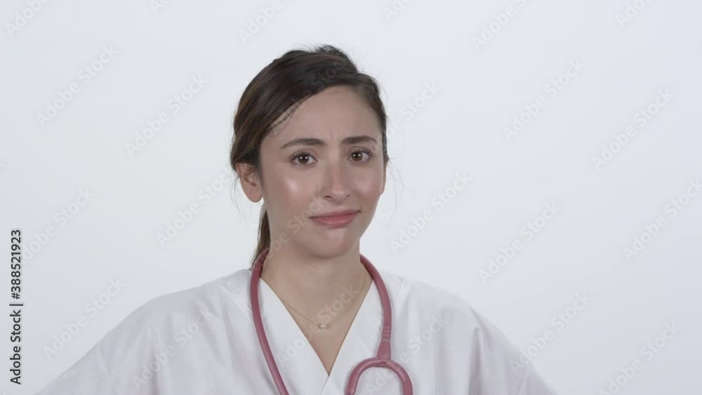 Medical personnel shaking head as she is grossed out from what she is hearing about symptoms. Medical personnel shaking head as she is grossed out from what she is hearing about symptoms.