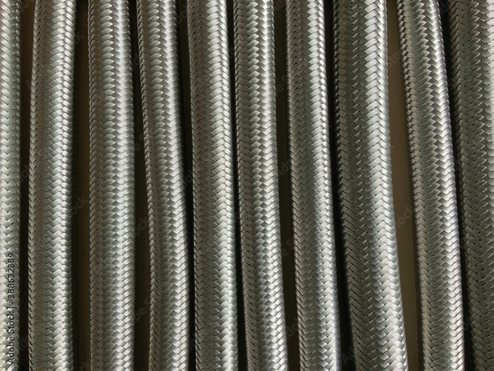 Close up on the flexible hose of the water pipe system. Close up on the flexible hose of the water pipe system.