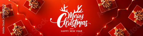 Merry Christmas & Happy New Year Promotion Poster or banner with red gift box and LED String lights for Retail,Shopping or Christmas Promotion in red and black style.