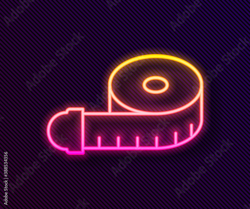 Glowing neon line Tape measure icon isolated on black background. Measuring tape. Vector.