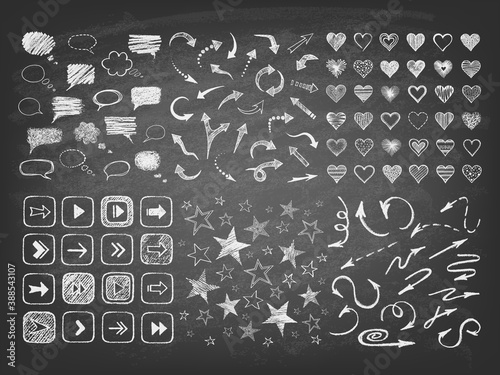 Talking bubble set and collection of stars, arrows, hearts on the blackboard. Set of hand drawn symbols. Vector illustration.