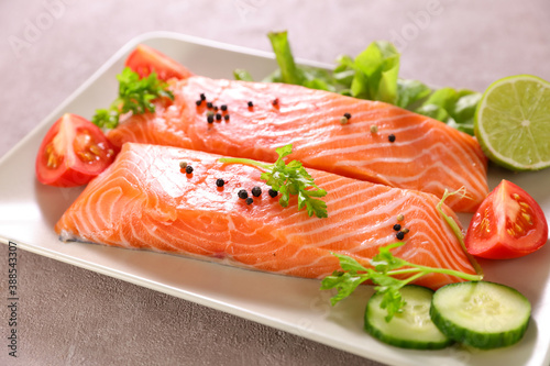 raw salmon fish and herbs