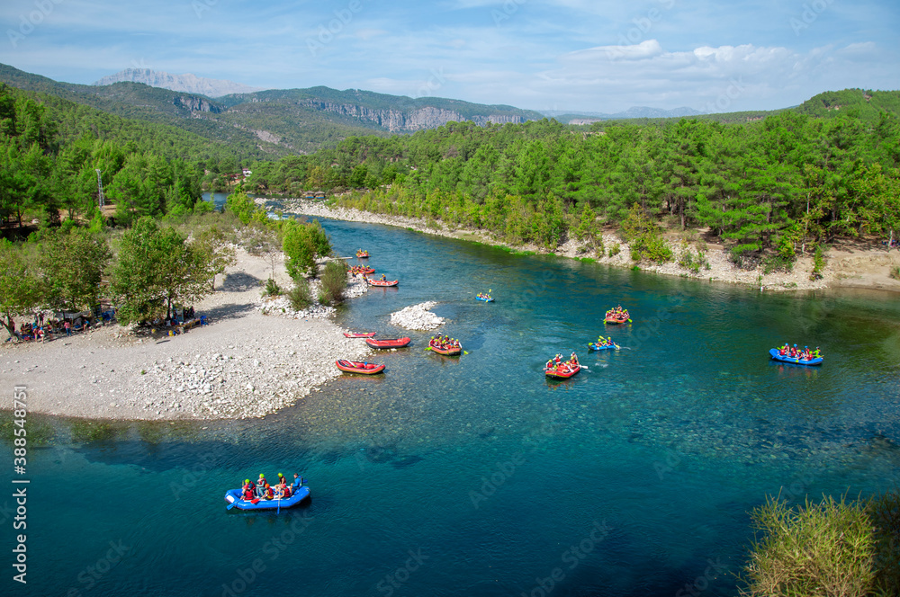 Koprucay or koprulu river valley with Taurus mountains and rocks, Turkey. Famous by its rafting spots. Stream rapids at the foreground