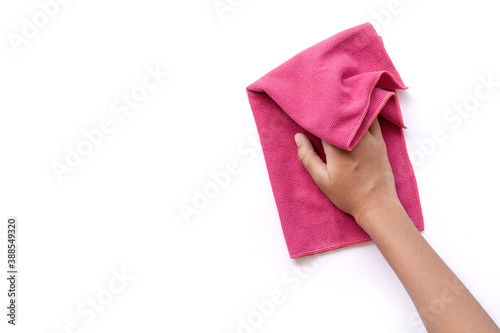  hand holding pink duster microfiber cleaning cloth isolated on white background with clipping path. Space for your text. Top view. 