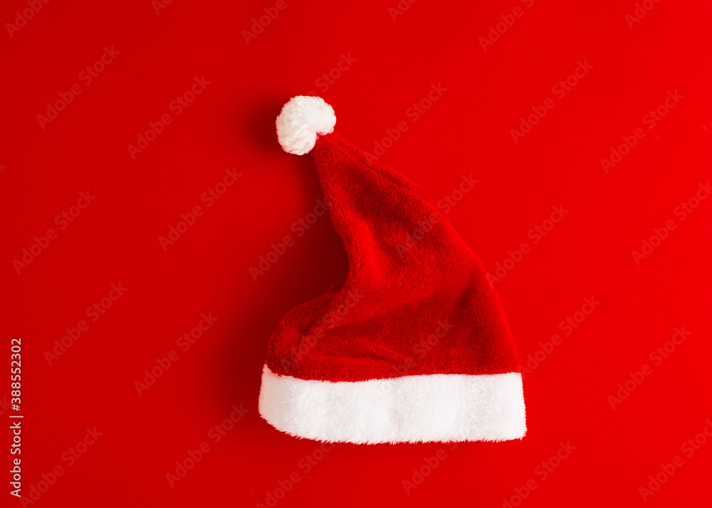 Christmas Santa Claus hat on red Christmas Santa Claus hat on red