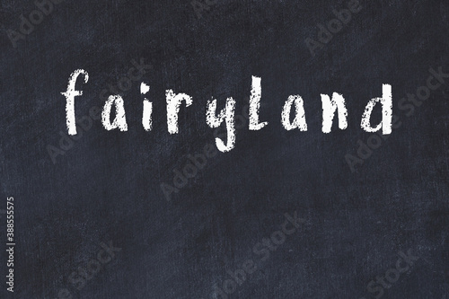 Fotografie Black chalkboard with inscription fairyland on in